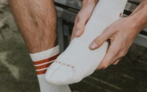 person wearing white nike socks